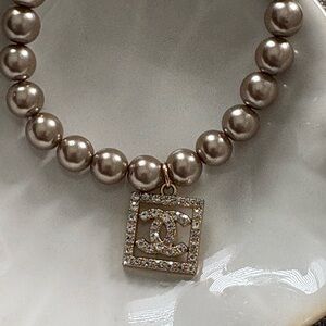 Elegant Pearl Bracelet with Gold Charm